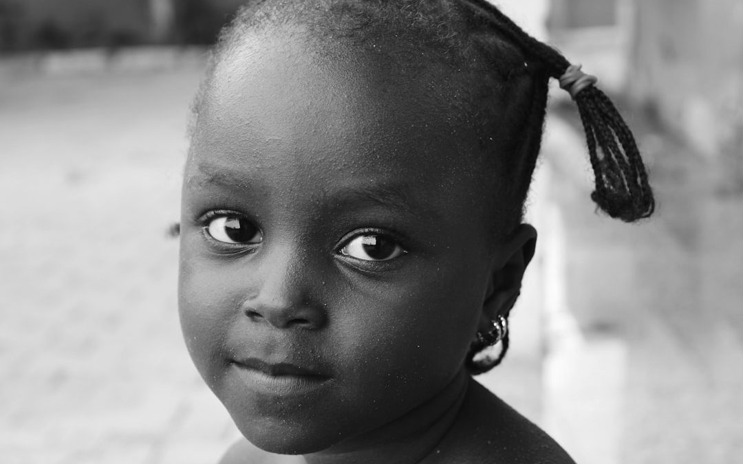 Photo Child taking medicine