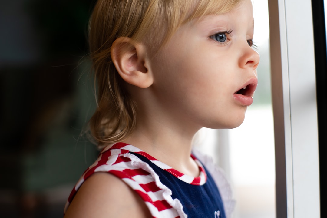 Photo Child taking medicine